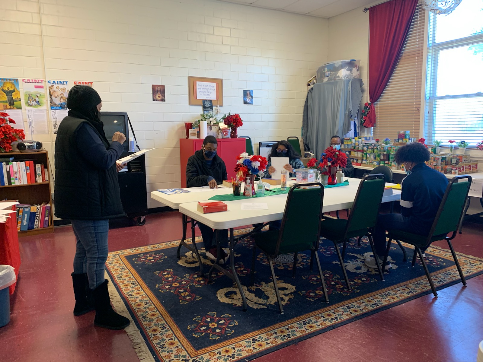 Sacrament of Confirmation Catechist Ms. Regina Charlot and Confirmands learn the importance of growing in the Catholic church and continuing to follow the Catholic Faith