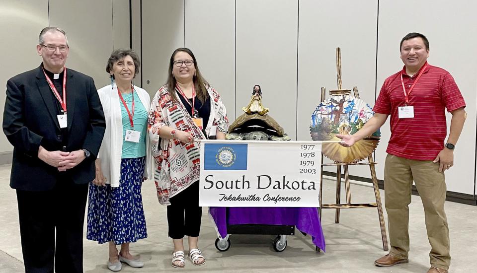 Jenny and Ben Black Bear, Germaine Little Bear, and Bishop Peter Muhich at the conference